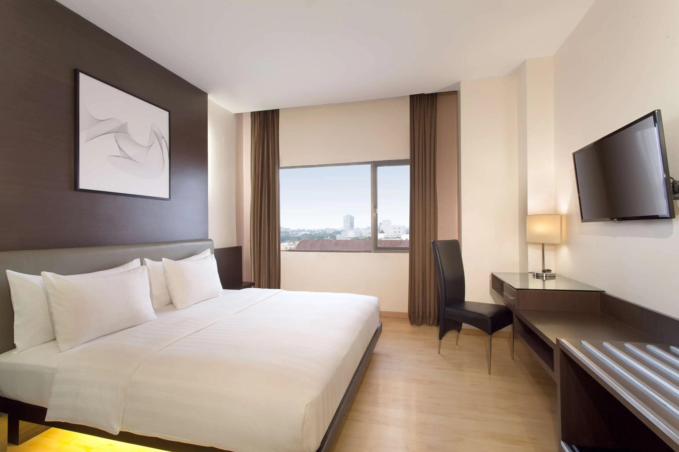 Aiho Hotel Medan Extérieur photo