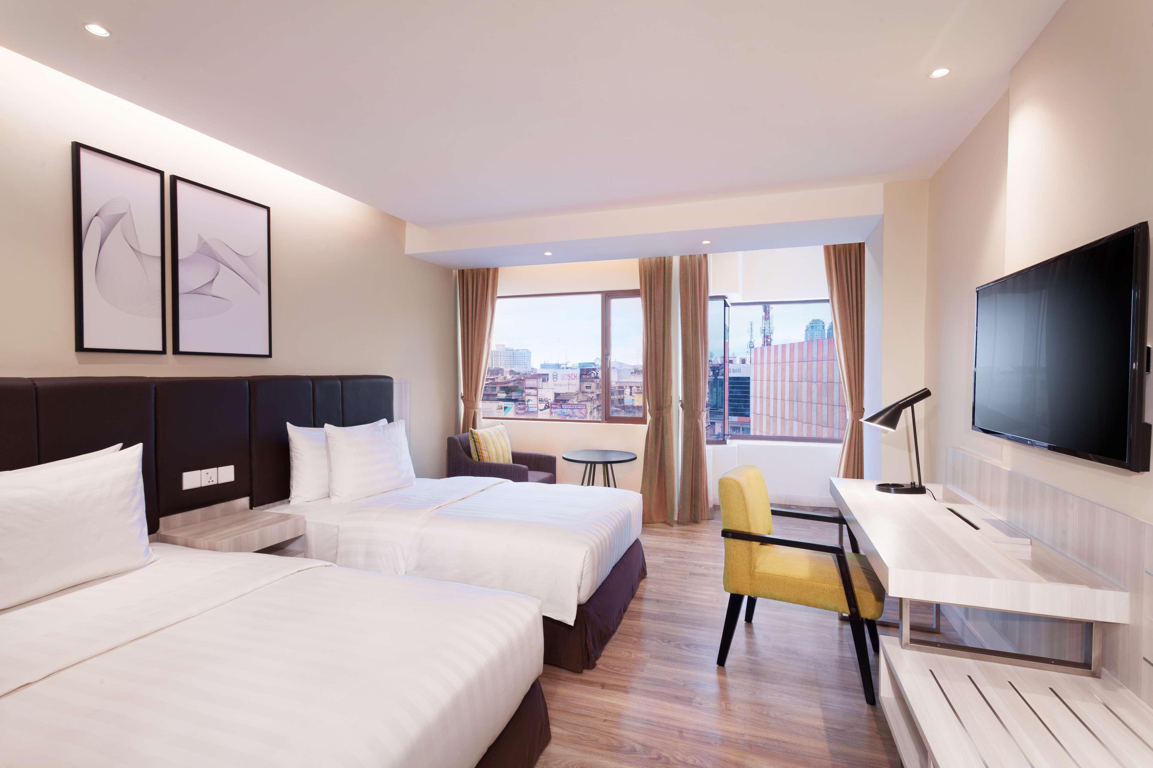 Aiho Hotel Medan Chambre photo