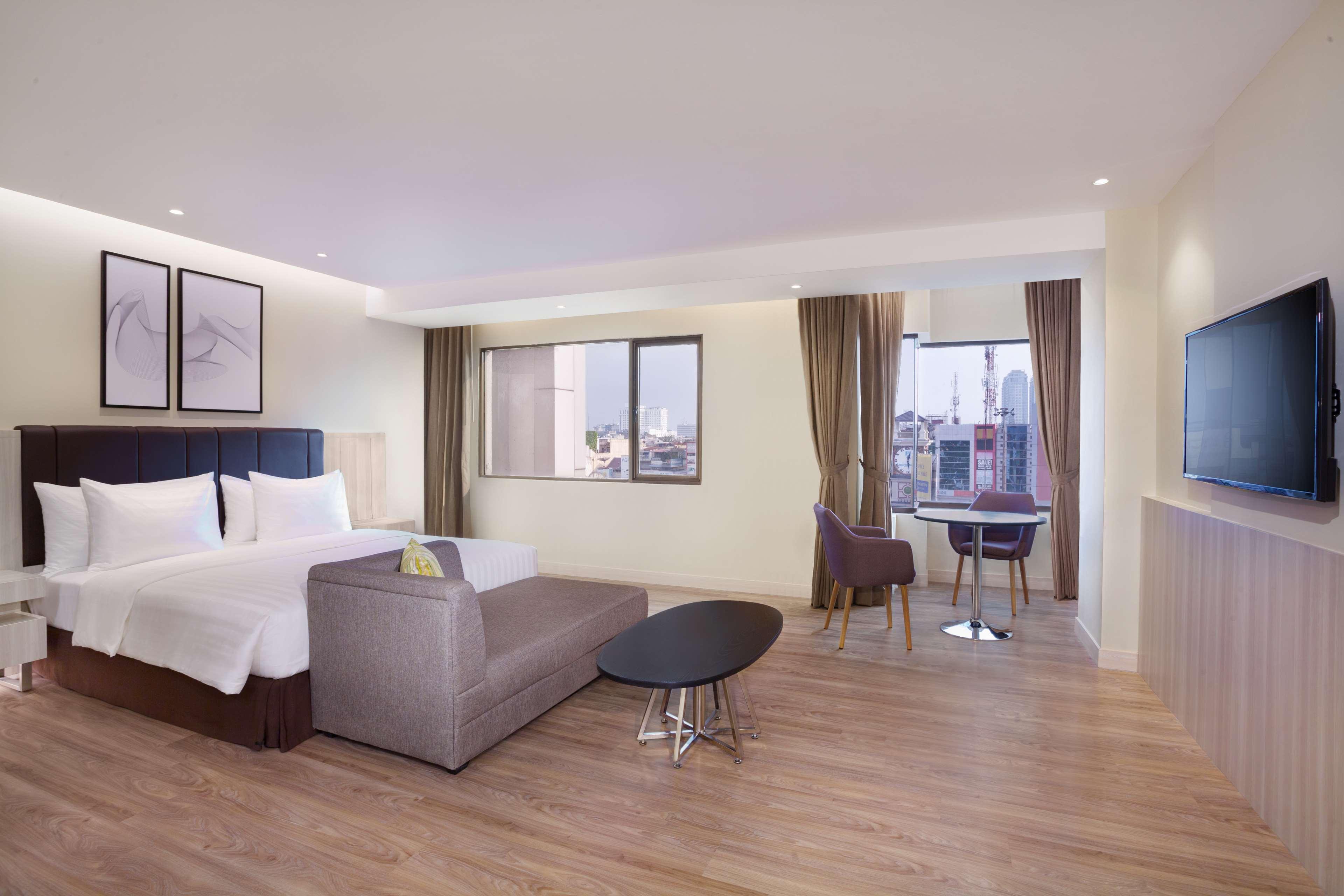 Aiho Hotel Medan Extérieur photo