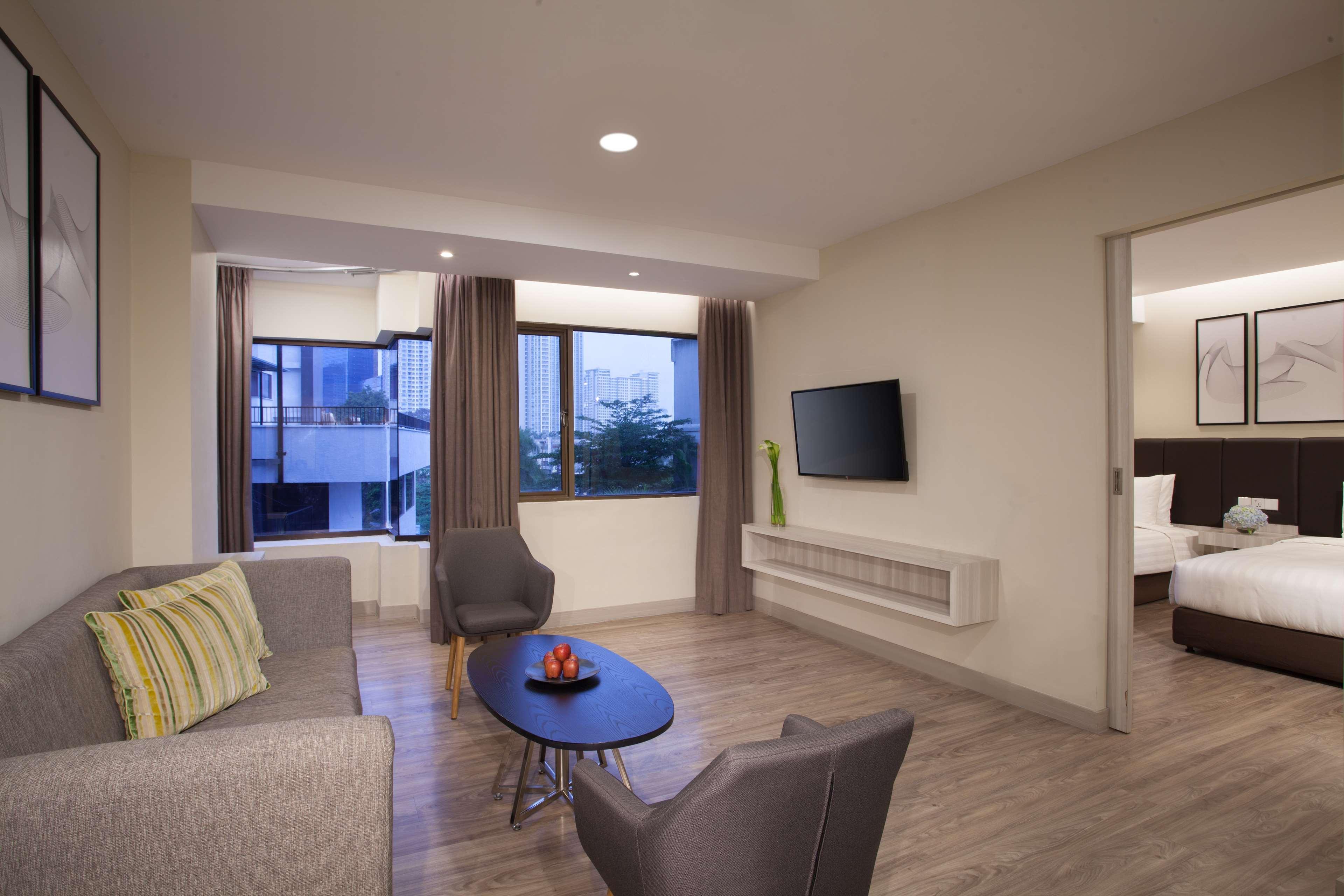 Aiho Hotel Medan Extérieur photo
