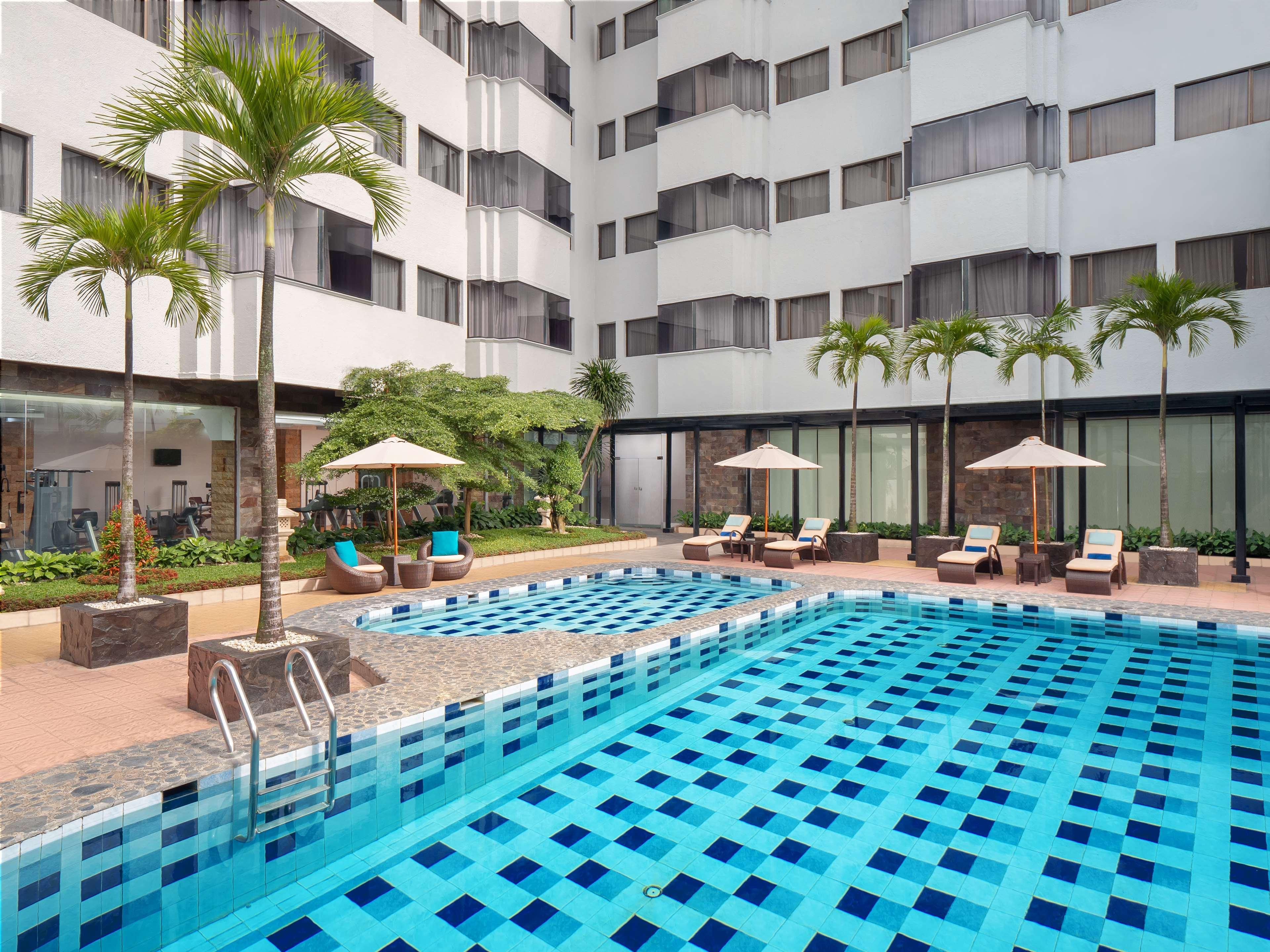 Aiho Hotel Medan Extérieur photo
